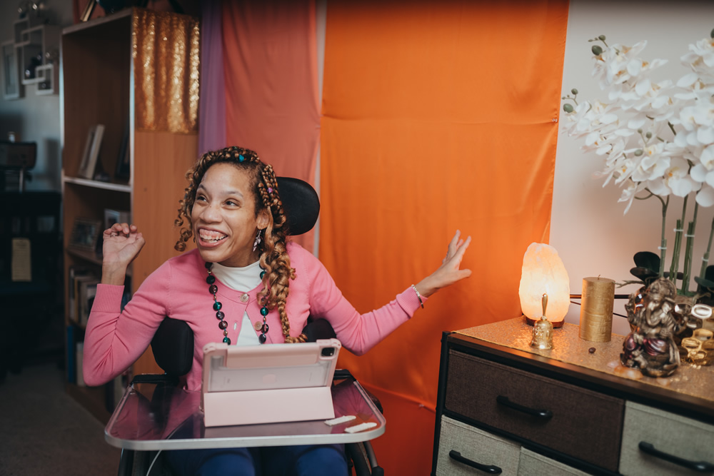 Photo of Allison V. Thompkins at her work desk.